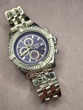Silver Chronograph Watch with Purple Dial